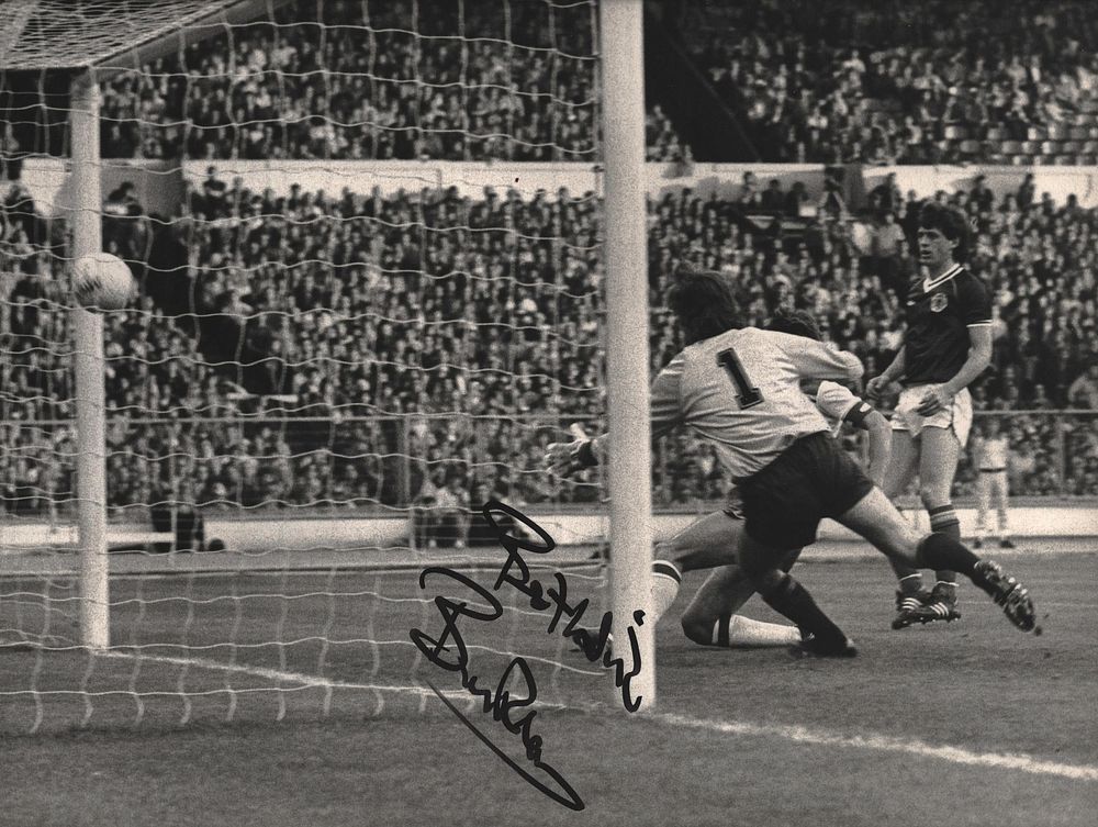 Lot 242: Bryan Robson signed 9x7inch black and white photo...