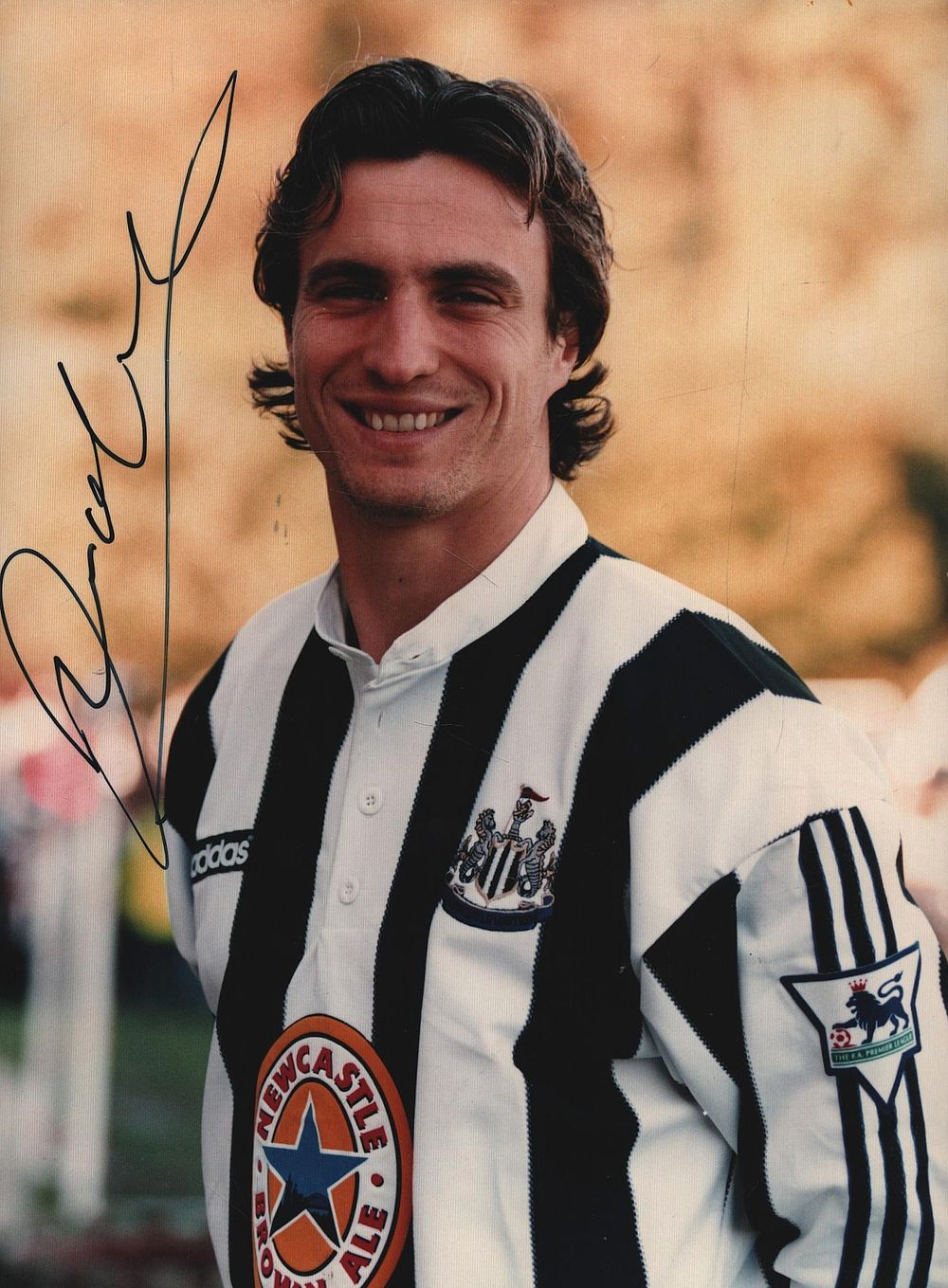Lot 253: David Ginola signed 7x5inch Newcastle United colour photo.