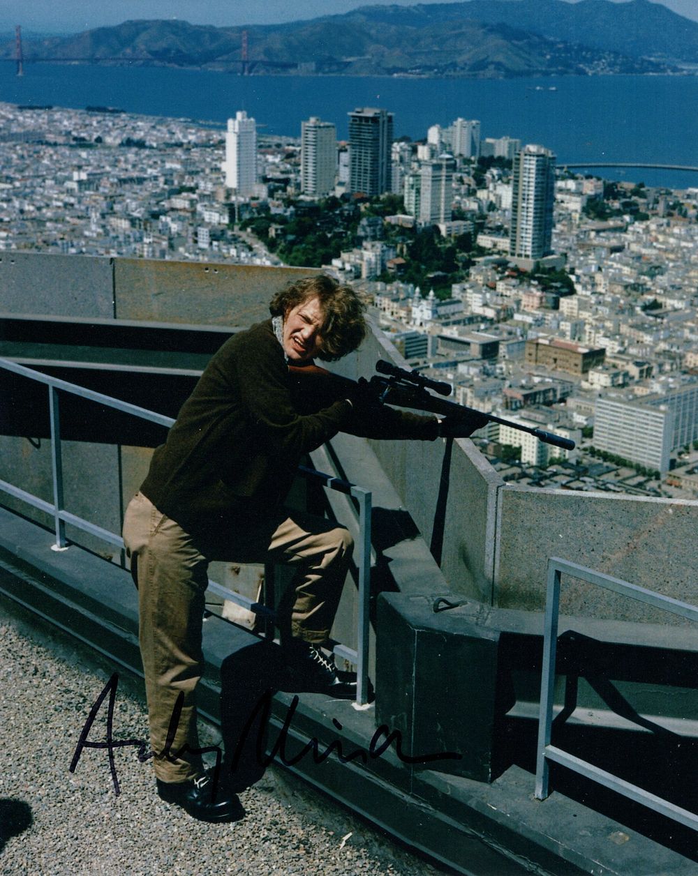 Lot 487: Dirty Harry colour moive scene 8x10 photo signed...