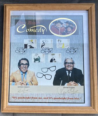 Comic legends the Two Ronnies signed Commemorative card depicting and signed by Ronnie Barker 