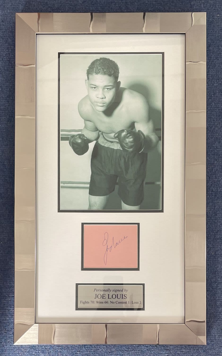 Lot 157: Joe Louis 24x14 overall size mounted and framed...