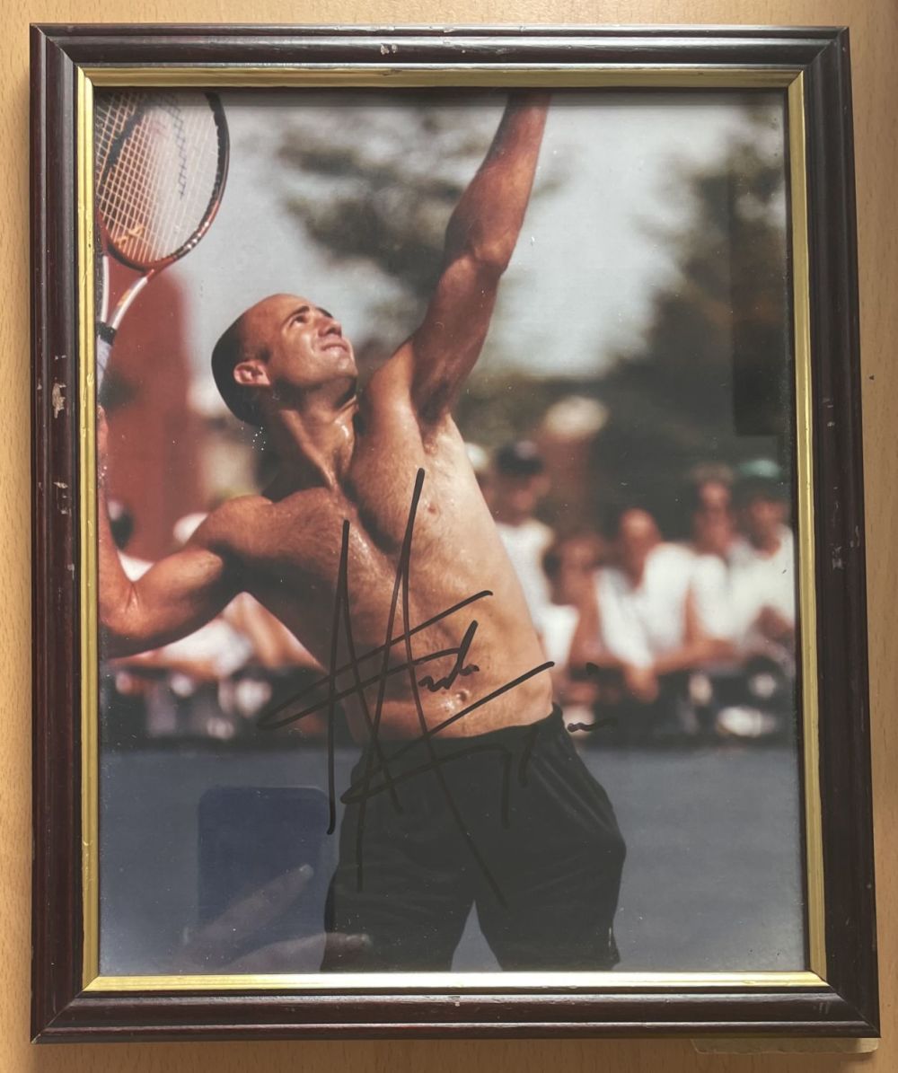 Lot 176: Andre Agassi 9x11 signed mounted and framed photo....