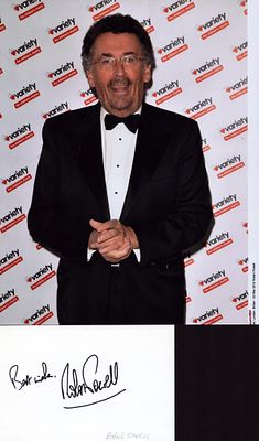 Coloured photograph of Ropert Powell with signature card 8x10inch.