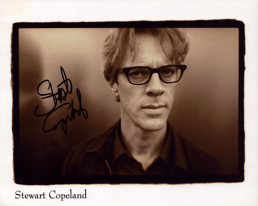Lot 180: Stewart Copeland signed 10x8inch black and white photo.