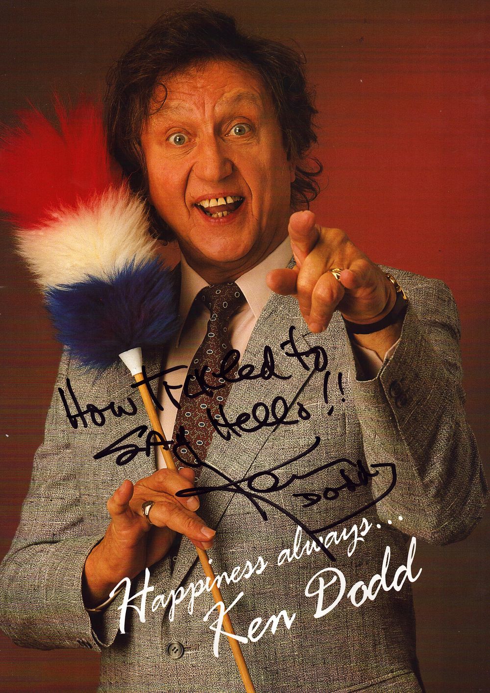 Lot 192: Ken Dodd signed programme. Signed on front cover.