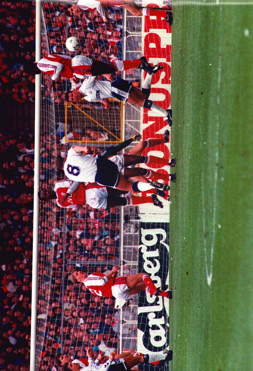 Lot 384: Tottenham Hotspur against Arsenal unsigned 18x12inch photo of...