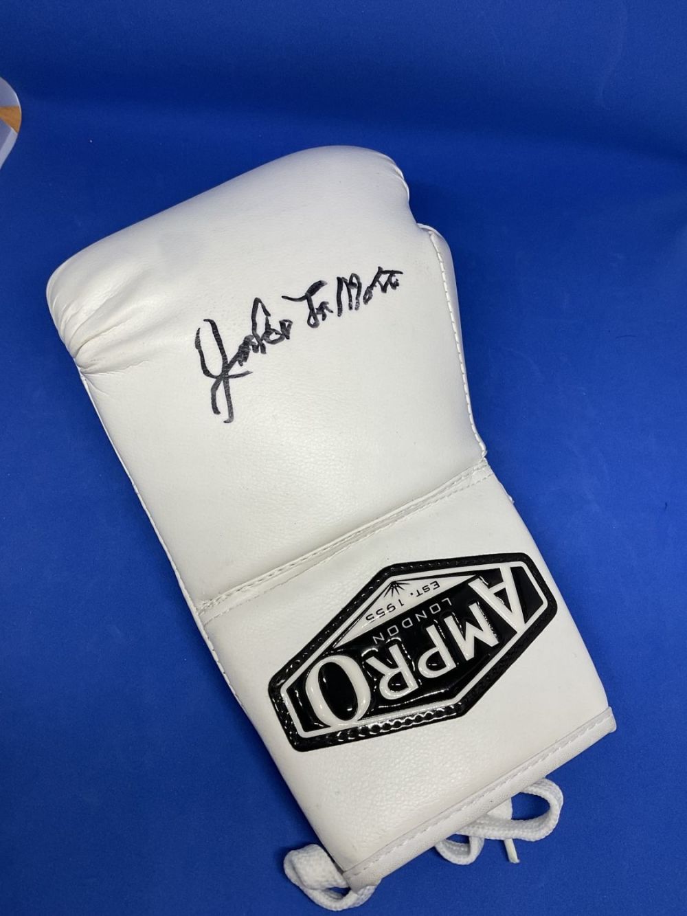 Lot 266: Jake LaMotta signed white Ampro London boxing glove....