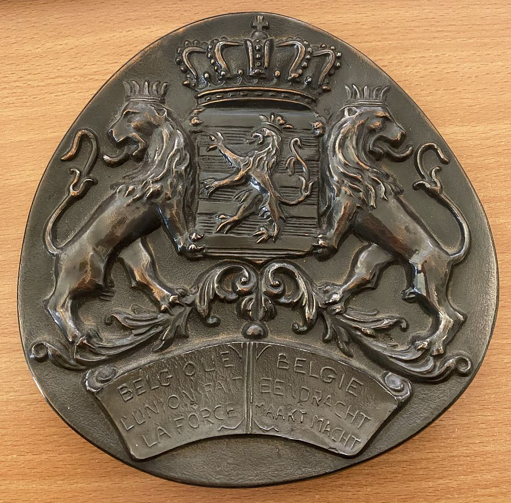Lot 196: Vintage metal wall plaque with the Greater Coat...