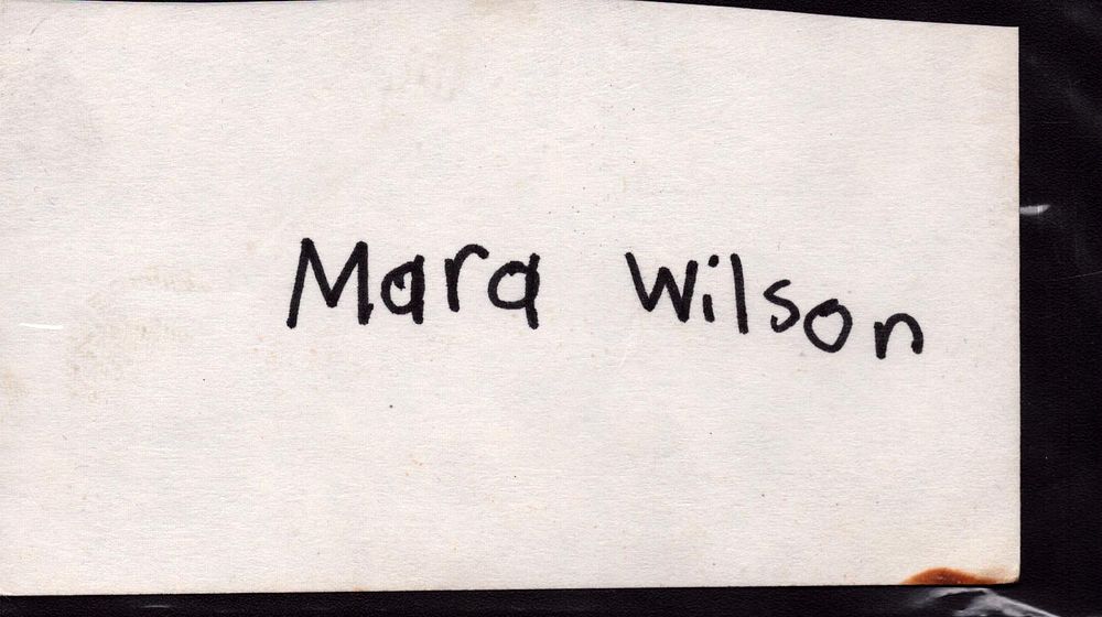 Lot 336: MARA WILSON Actress signed Card with Photo .