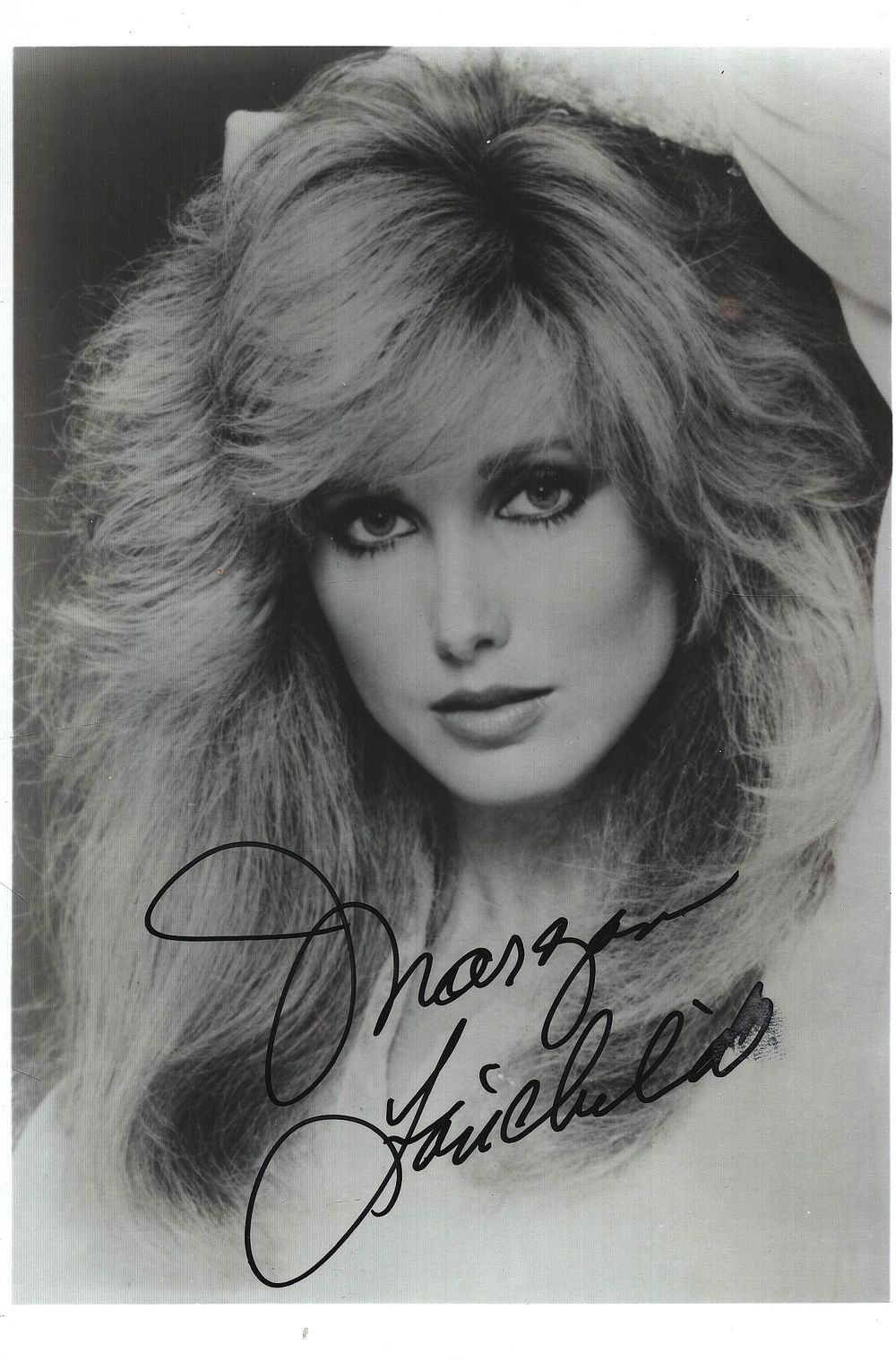 Lot 371: Morgan Fairchild signed 7x5inch black and white photo.