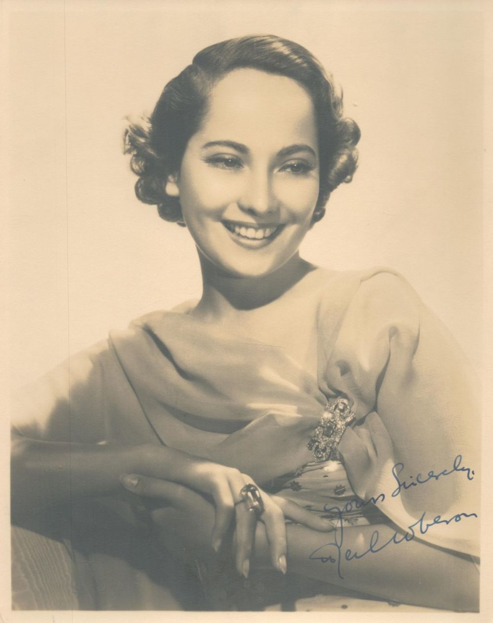Lot 301: Merle Oberon signed 10x8 vintage sepia photo. British...