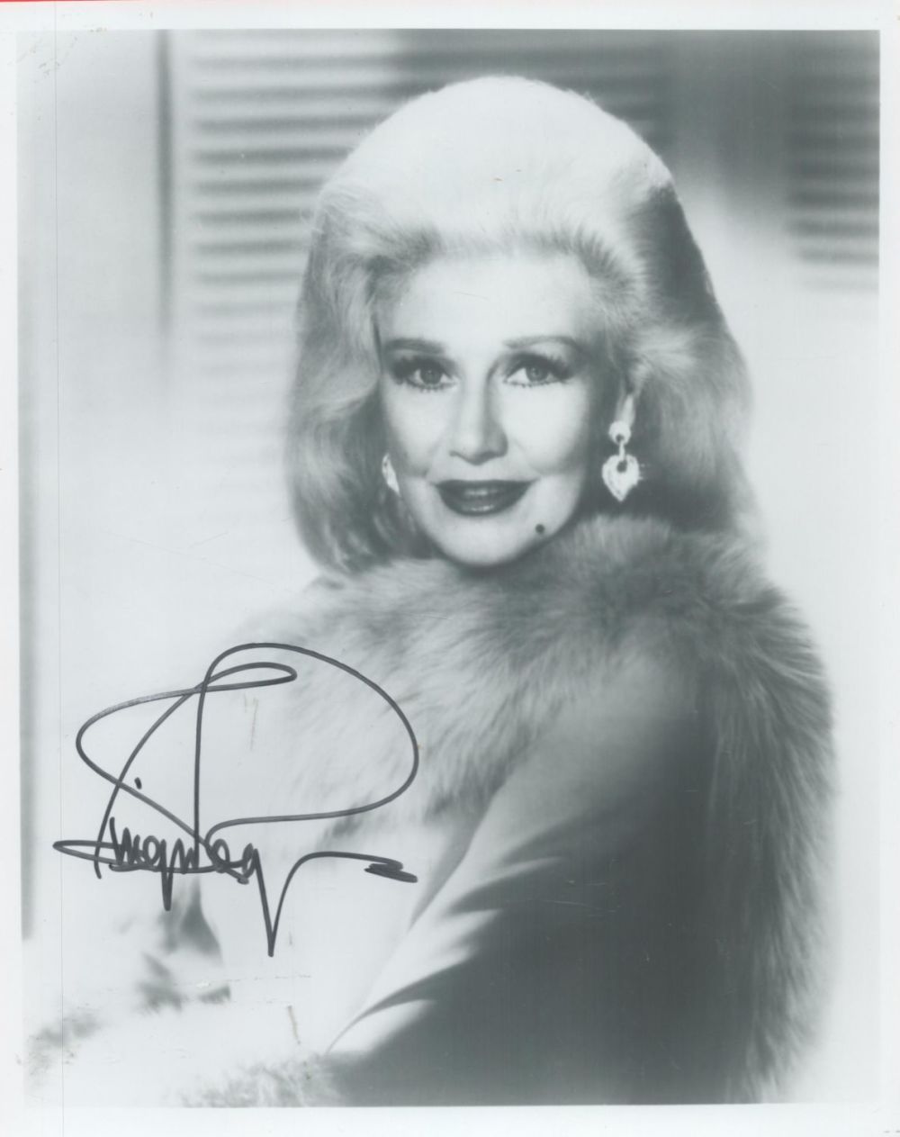 Lot 303: Ginger Rogers signed 10x8 black and white photo....
