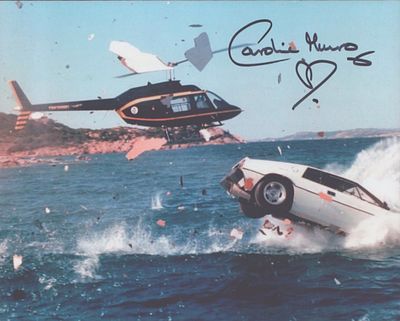 Caroline Munro signed 10x8inch colour photo.