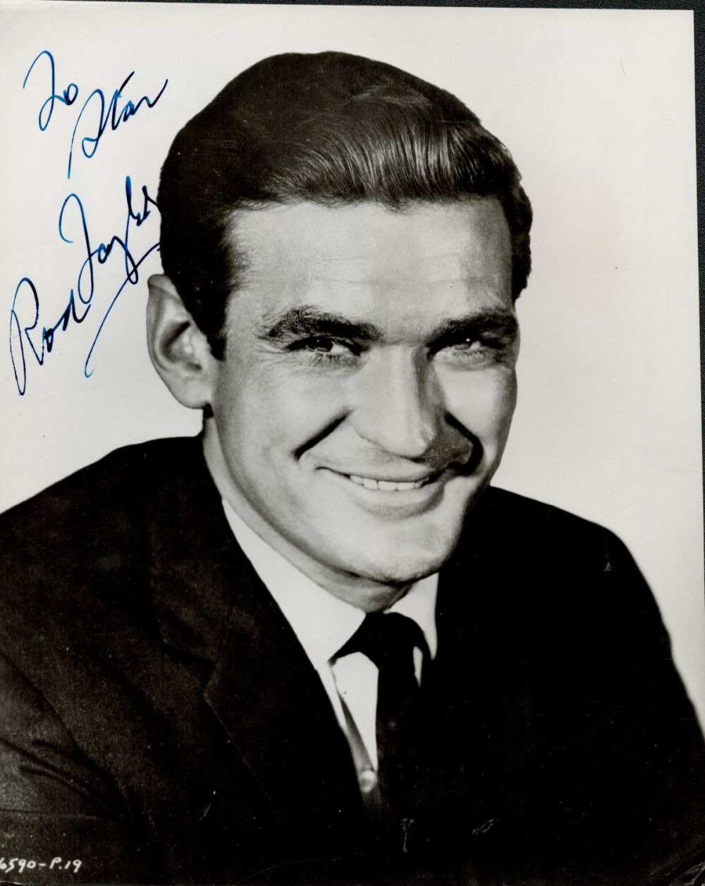 Lot 322: Rod Taylor signed 9x8 black and white photo....