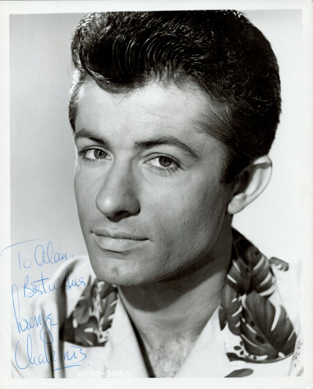 Lot 330: George Chakiris signed 10x8 black and white photo....