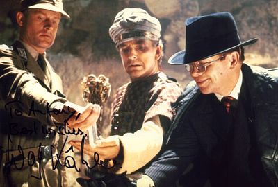 Wolf Kahler signed 12x8inch Indiana Jones colour photo. Dedicated.