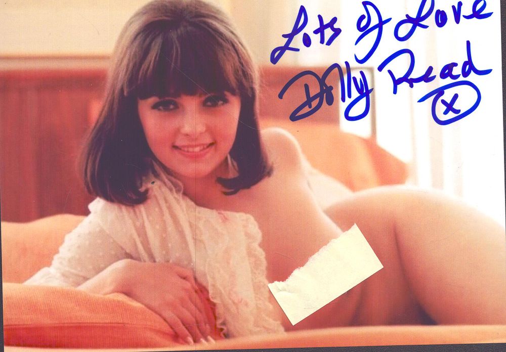 Lot 156: Dolly Read signed 7x5inch colour risqué photo.