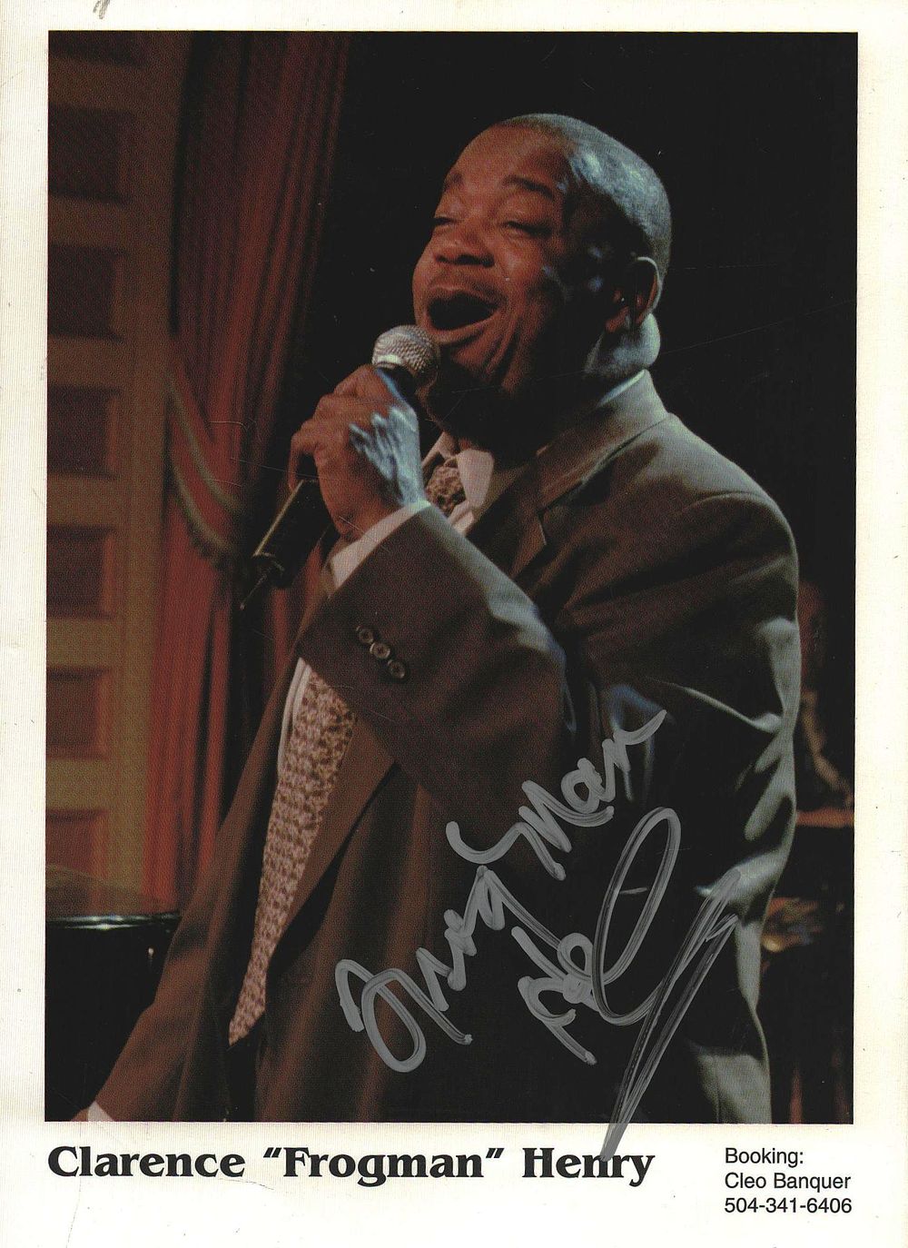 Lot 219: Clarence 'frogman’ Henry signed 7x5inch colour photo.