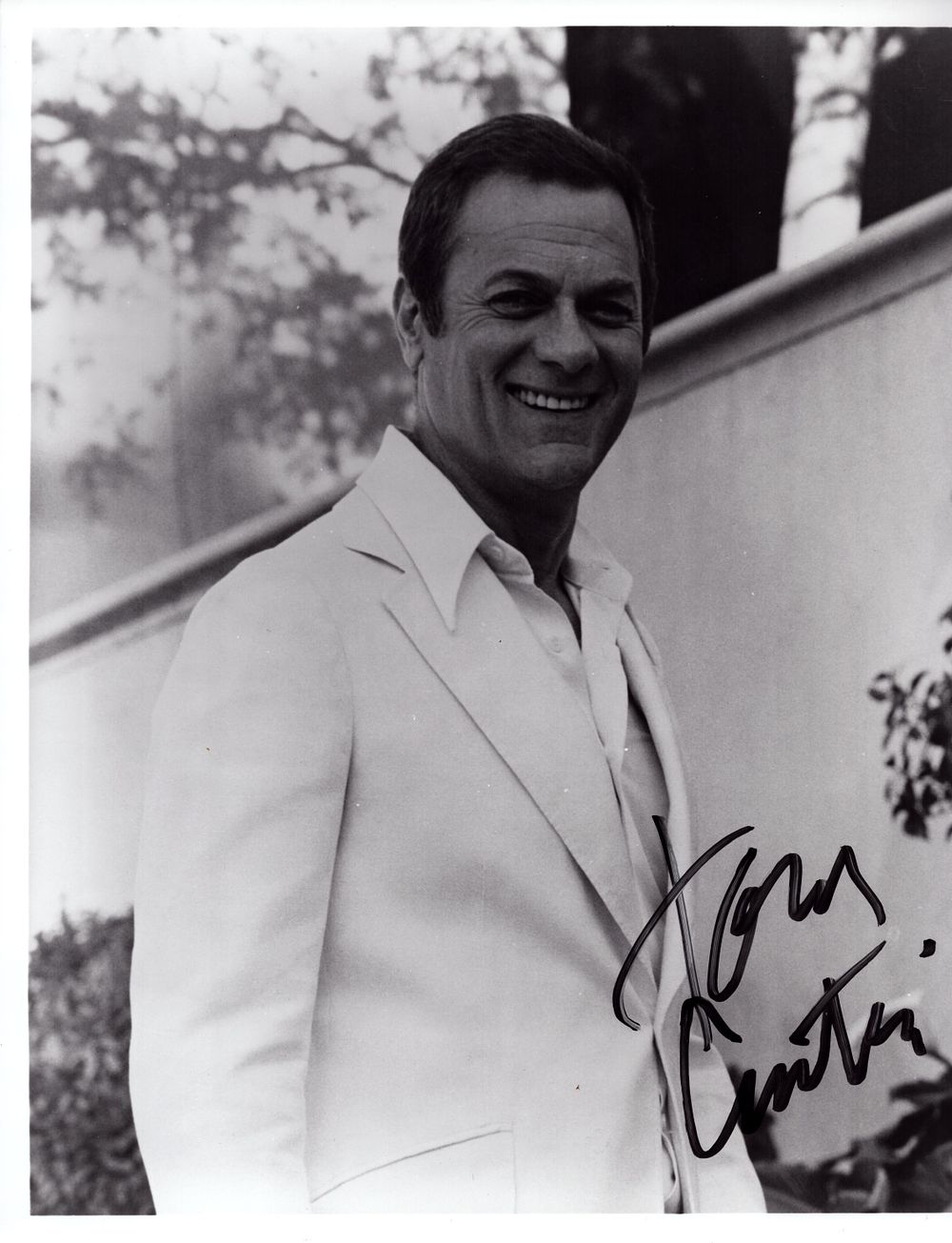 Lot 298: Tony Curtis signed 8x10 black and white photo.