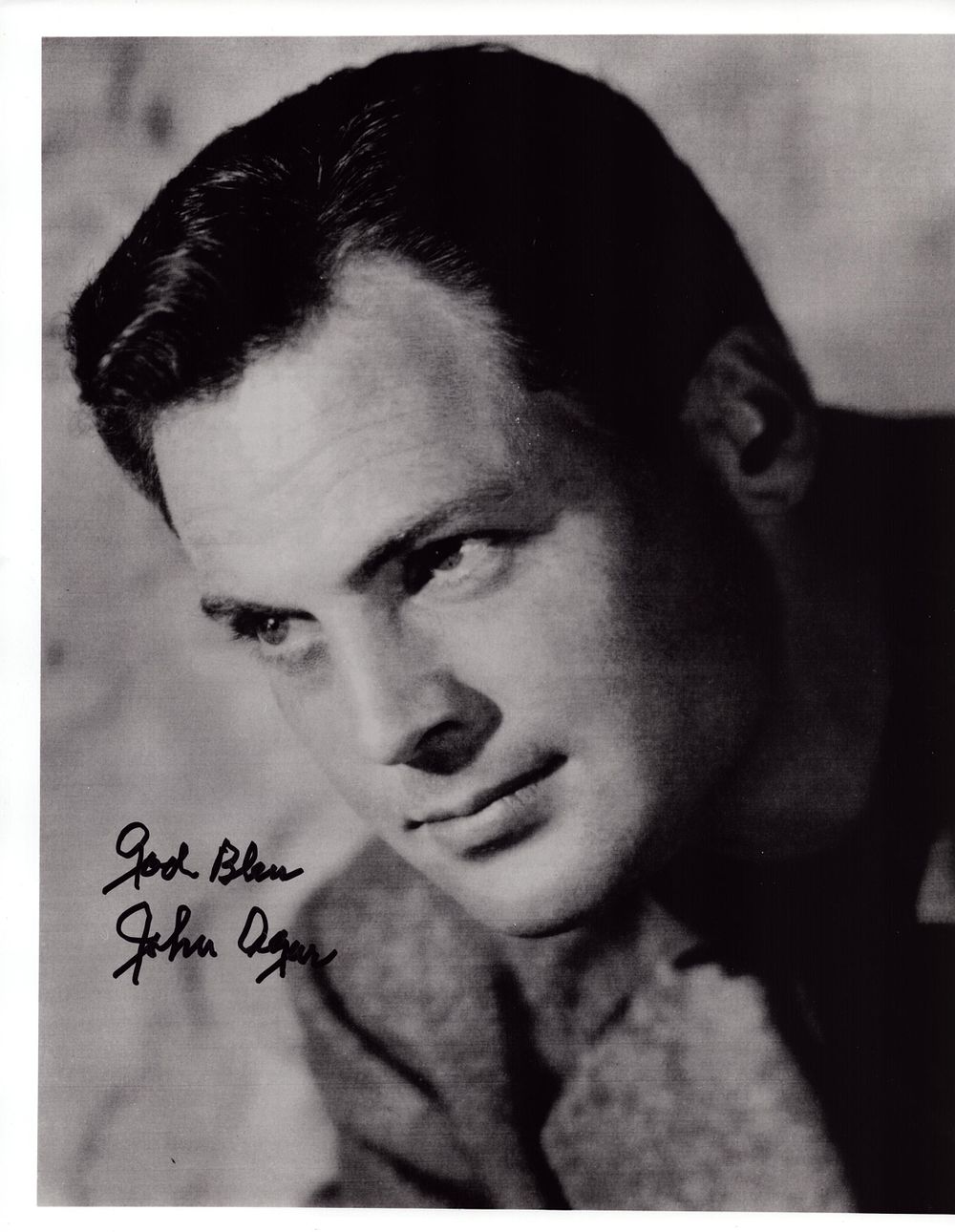 Lot 324: John Agar signed 8x10 black and white photo.