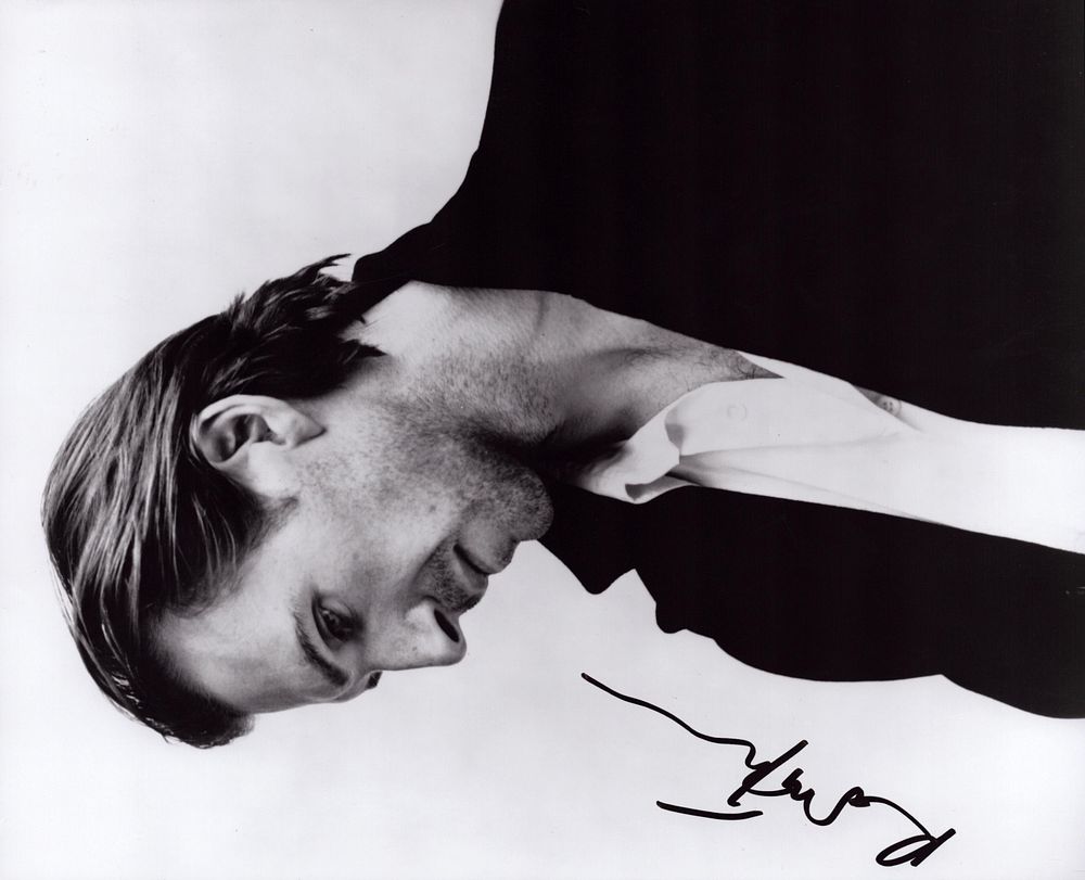Lot 343: Ralph Fiennes singed 8x10 black and white photo.
