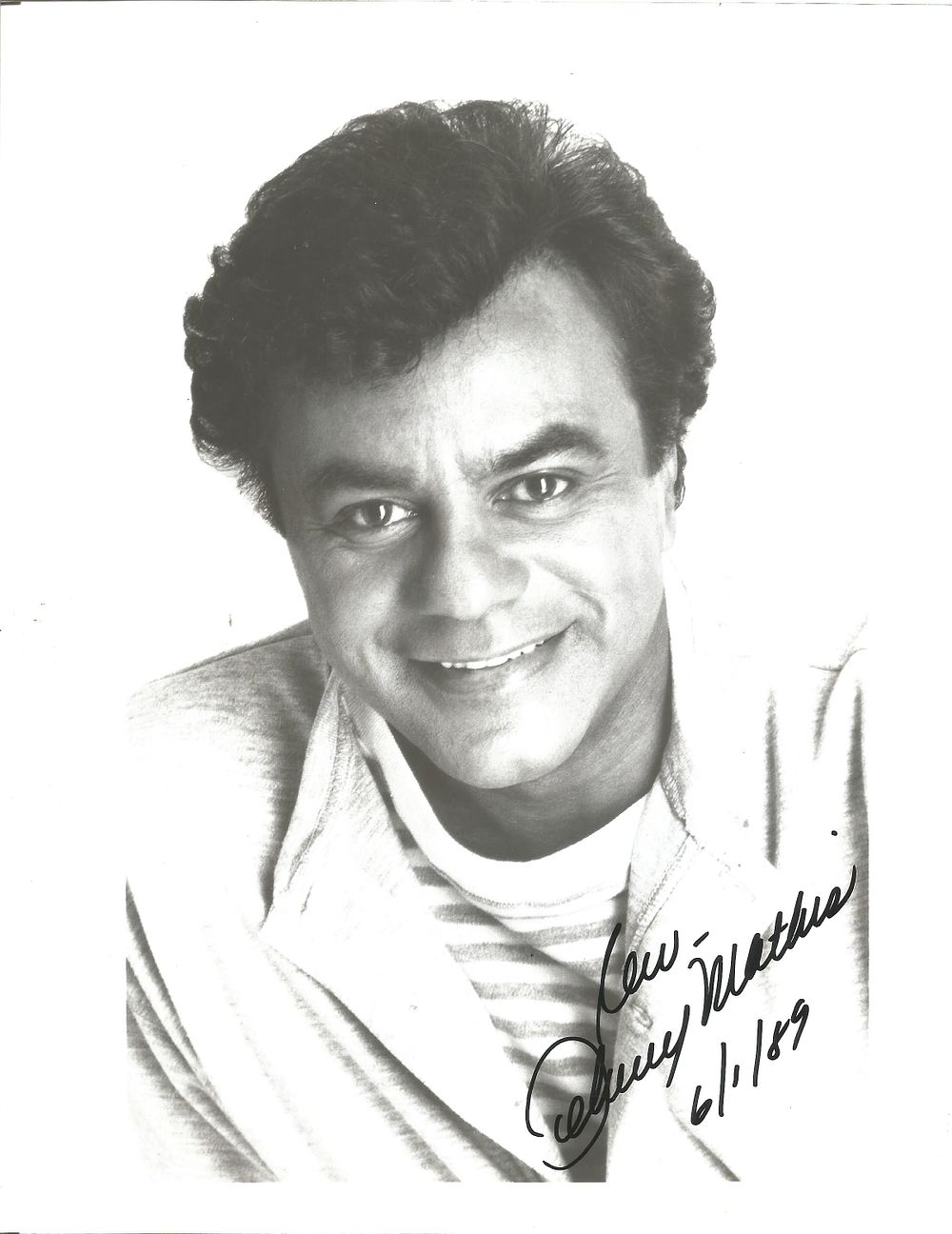 Lot 419: Johnny Mathis Signed 10X8 inch black and white...
