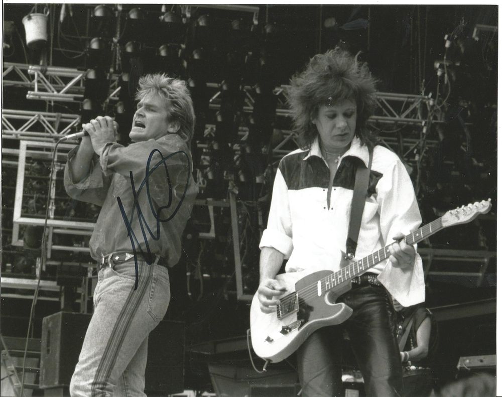 Lot 460: the alarm signed 10 by 8 inch black...