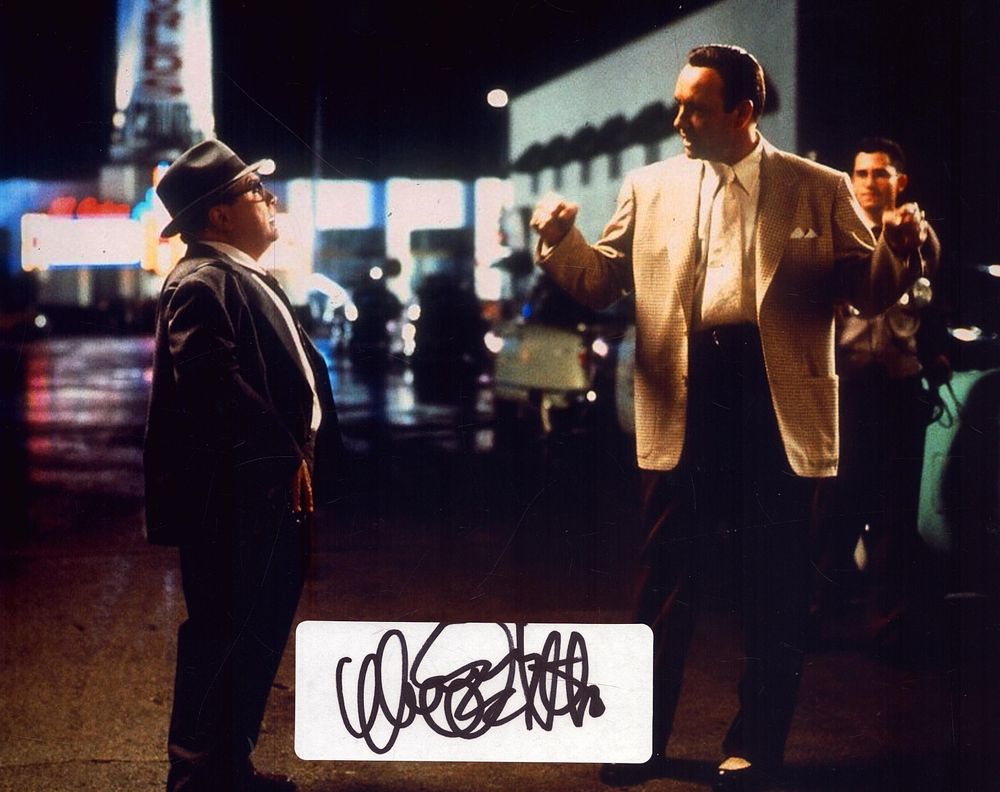 Lot 309: Danny Devito signed label attached to a 10X8...