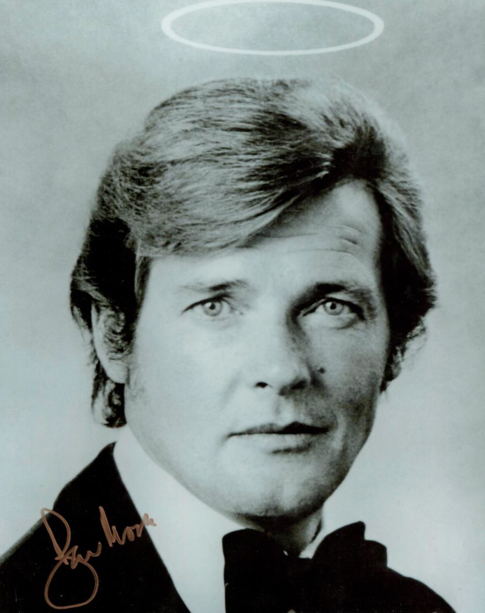 Lot 541: Roger Moore. The saint actor 10x8 black and...
