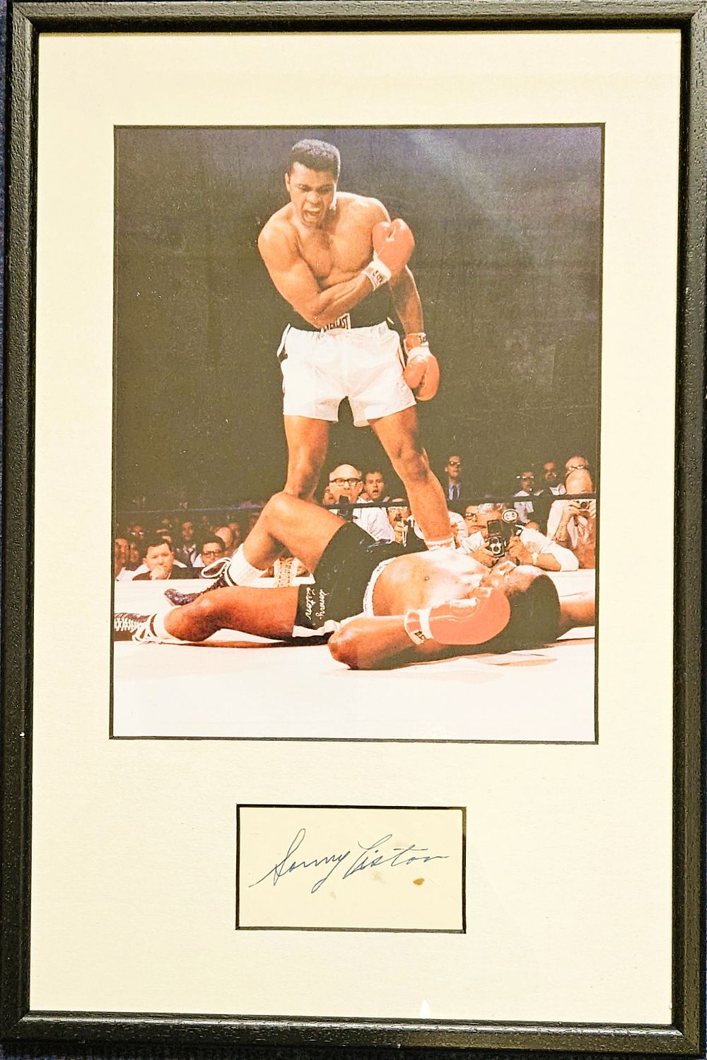 Lot 157: Sonny Liston Signature piece framed and mounted below...