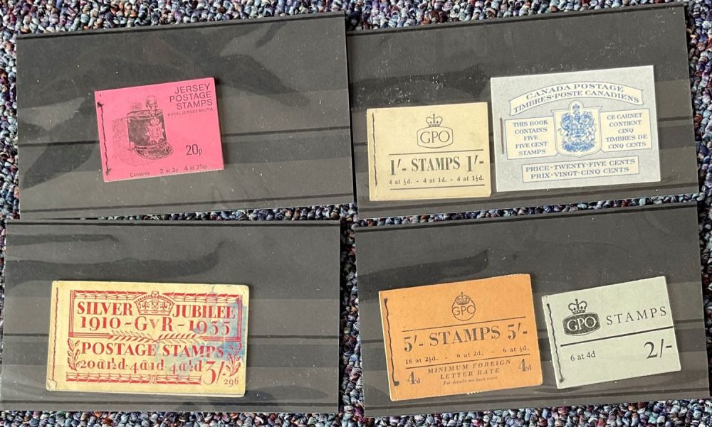 Lot 708: Stamp booklet collection. Includes GB 1935 silver jubilee...