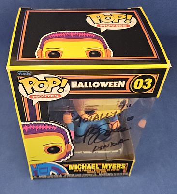 PJ Sole signed Michael Myers Halloween Funko Pop signed on box window.