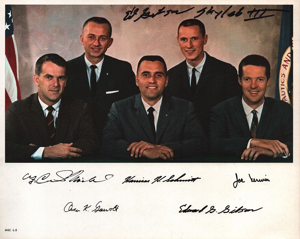 Printed NASA scientist astronauts printed signatures including F Curtis Michel, Harrison 
