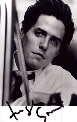 Hugh Grant Signed 6X4 inch black and white photo.
