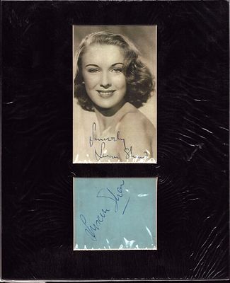 Susan Shaw Signature piece mounted below signed black and white photo Approximate overall size 