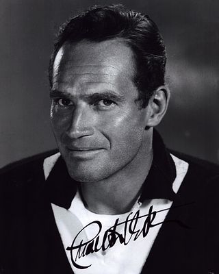 Charlton Heston signed 10X8 inch black and white photo