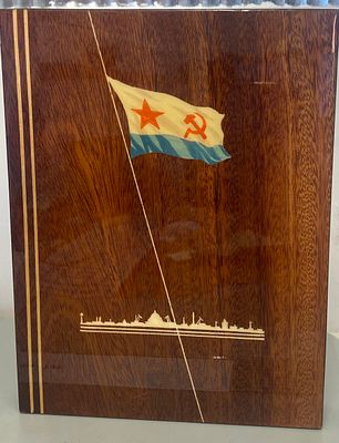 Soviet era souvenir display item depicting the October Revolution Medal and an illustration of 