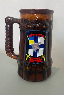 Ceramic beer stein with a brown glazed finish with the emblem for the Ukrainian Marine Corps on 