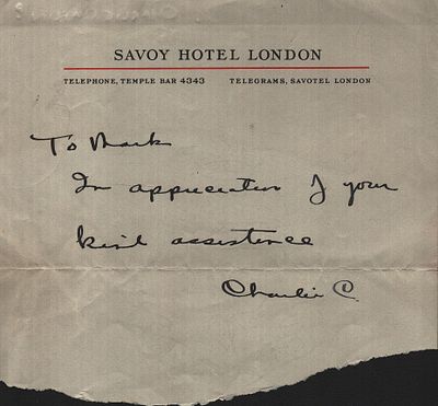 Charlie Chaplin signature on irregular cut note paper from the Savoy Hotel London .dedicated