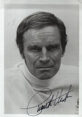 Charlton Heston signed 7 X5 inch black and white photo.