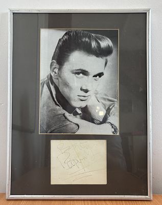 Ricky Nelson signed card mounted with black and white photo, 12x16 framed.