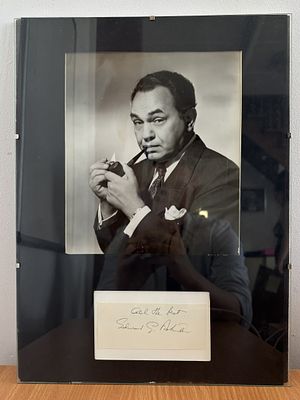 Edward G. Robinson signed card mounted with black and white photo. 12x16 framed.