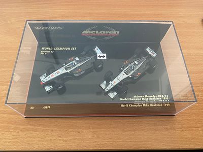 World Champion Set Edition 43 Set 6 McLaren Mercedes MP4/13 and MP4/14 Minichamps model car, 1:43.