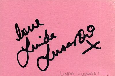 Linda Lusardi signed six by four inch pink card