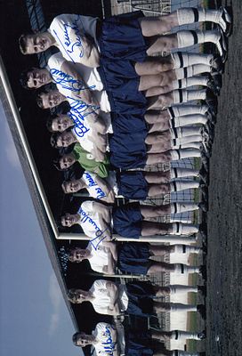Autographed TOTTENHAM 12 x 8 Photograph : Tottenham players pose shoulder to shoulder in the 