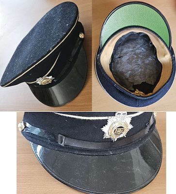 British Army personnel Cap black wool. British or Commonwealth military cap badge (often split 