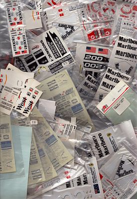 Racing and Formula 1 model decal collection.