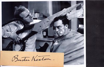 Buster Keaton signed 5x2inch page cutting with black and white photo.