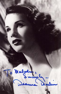 Deanna Durbin signed 5x4inch black and white photo.