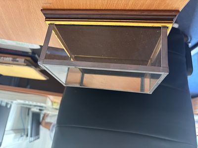 Clear display case with mirrored back and black plush insert on base, good size for model 